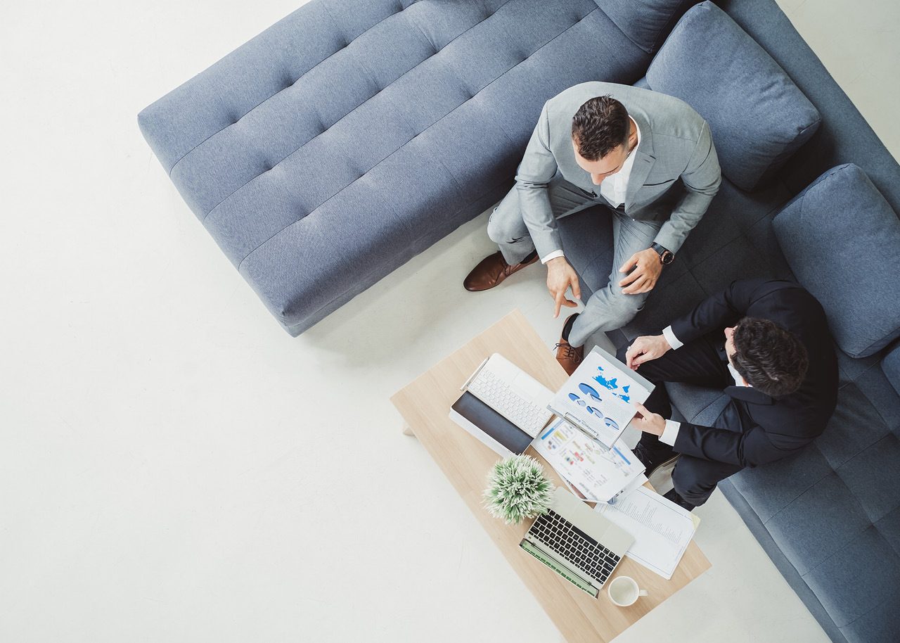 Aerial image of professional business meeting between males